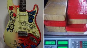 This music will take you high: Drug smuggler caught with COCAINE GUITAR at Cancun airport (PHOTOS)