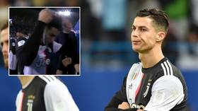 Crissed off: Dejected Cristiano Ronaldo removes loser’s medal immediately after his incredible run of victories in finals ends