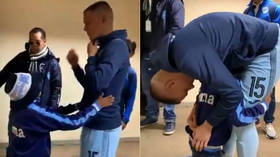 WATCH: Heartbreaking moment tearful young fan begs footballer on knees not to leave club