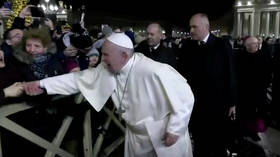 Pope Francis repeatedly SLAPS woman’s hand after she YANKS him toward her (VIDEO)