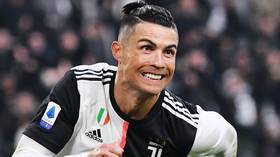 Hat-trick hero: Cristiano Ronaldo arrives with iPod Shuffle, then nets second-half treble to fire Juventus back to Serie A summit