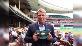 Australia’s cricketing ‘King of Spin’ Shane Warne sells prized Baggy Green cap for bushfire victims