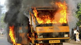 Massive fire & series of explosions after Indian gas truck hits SCHOOL BUS in head-on collision (VIDEOS)