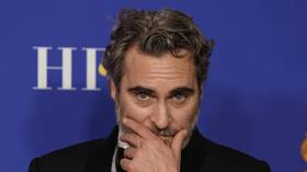 ‘We are the woke’: Joaquin Phoenix joins Jane Fonda at DC climate protest, to preach about meat & dairy and flight-shame himself