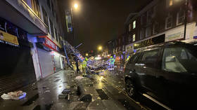 Gone with the wind: Storm Brendan blows roof off building, blocking ENTIRE STREET in English town (VIDEOS)