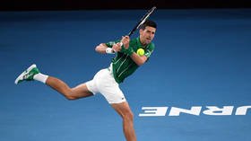 Novak Djokovic defeats German rival to take first step towards defending Australian Open title