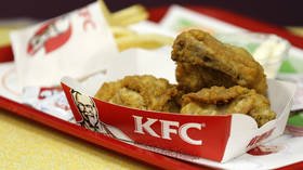 Victim of PC culture or clever PR stunt? KFC apologizes over ad featuring boys staring at woman’s breasts