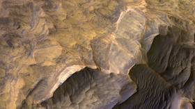 For the crater good: ESA shares incredible, never-before-seen view of icy Martian canyon (VIDEO)