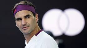 Fed-up Federer says multilingual line judge landed him with a $3,000 fine for SWEARING during Australian Open quarter-finals