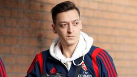 Whether cowardly or vindictive, there is much more than meets the eye to Mesut Ozil's suspicious Arsenal squad snub