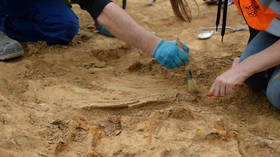 Ancient grave circles filled with cremated human bones found under Belgian football pitch