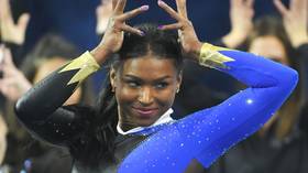 Perfect 10! Gymnast Nia Dennis floors the competition with incredible Beyonce-inspired routine (VIDEO)