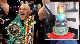 Sweet taste of success: Tyson Fury celebrates WBC title win with HUGE five-tier cake