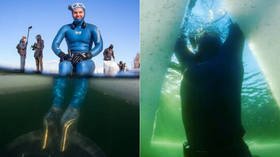 ‘ONE BREATH’: Russian free-diver swims record-breaking 181m under ice in memory of famed mother (VIDEO)