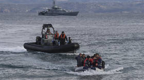 Greek coastguard ATTACKS migrant dinghy and shoot into water amid border mayhem (VIDEO)