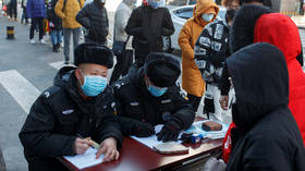 Beijing to quarantine travelers from coronavirus hotspots as China sees spike in IMPORTED cases