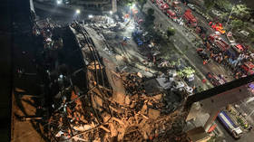 Chinese hotel used as Covid-19 quarantine site COLLAPSES, trapping dozens under rubble (VIDEOS)