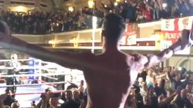 Sing when you're winning: Watch British boxer Nathan Heaney's brilliant ring walk before winning middleweight title fight (VIDEO)