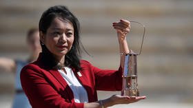 Tokyo 2020 Games organizers receive Olympic flame in scaled-down ceremony in Athens