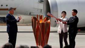 Olympic chief roasted for ‘light at end of the tunnel’ line as flame arrives in Tokyo while calls mount for Games to be postponed