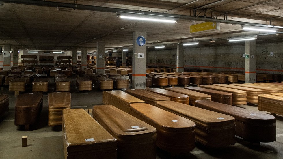 Spanish Parking Lot Converted Into Huge Makeshift Morgue As Covid 19 Deaths Surge VIDEO RT 