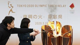 Tokyo 2020 organizers pass Olympic flame to Fukushima after Games postponement