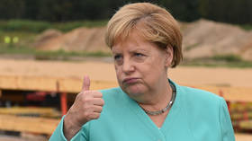 Angela Merkel ends self-isolation and returns to Chancellery after testing NEGATIVE for Covid-19