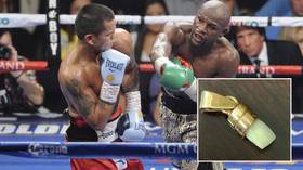 The tooth is out there: Former foe Marcos Maidana shows off trophy tooth he claims came from fight with Floyd Mayweather (PHOTO)