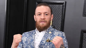 'Go ask my bollox': UFC star Conor McGregor involved in bizarre Twitter spat with ferry operator employee over Covid-19 measures