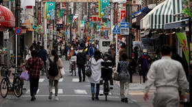 Japan wants citizens to cut interactions by 70% as Abe under pressure to hand out more cash