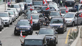 Lebanese MPs convene in theater after disinfectant spray, as protesters in Beirut resort to cars