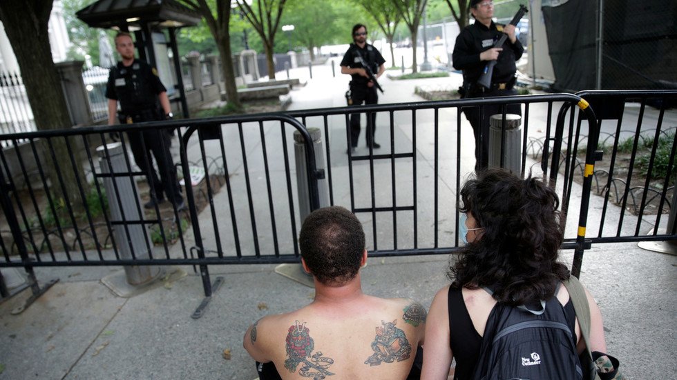 Placed under. Public protest Roadside. "Us Capital"+Kill. The White House Barricades itself Front of the North face.