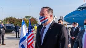 Was it worth it? Pompeo dons fashionable flag-themed mask at Israel airport... then takes it off for meetings