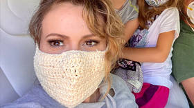 Alyssa Milano goes on defensive after showing off her KNITTED mask (that does NOTHING to stop Covid-19)