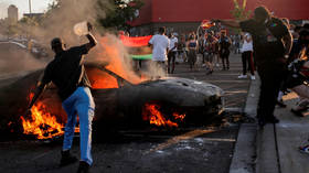 WATCH: Looters ransack Louis Vuitton, police HQ and smash BANKS as Portland erupts in protest