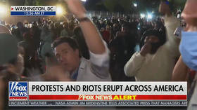 WATCH mob of protesters surrounding & shouting down Fox News reporter outside embattled WH