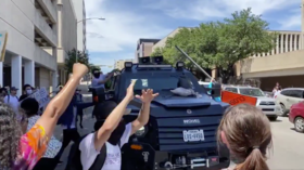 WATCH protesters attack InfoWars ‘battle tank’ at Black Lives Matter rally in Texas