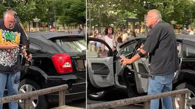 Driver pulls BOW & ARROW on protesters blocking road in Salt Lake City (VIDEOS)