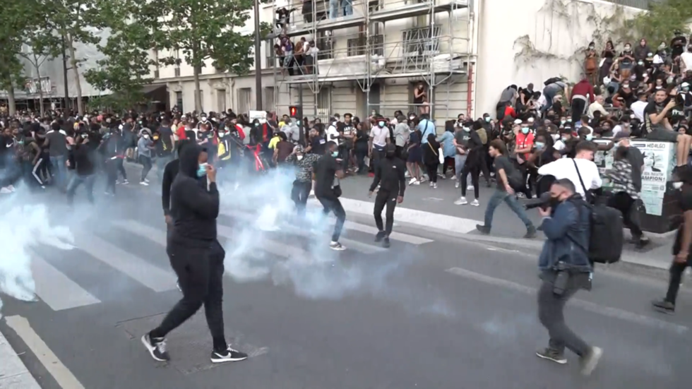 Fires & tear gas: Black Lives Matter march turns chaotic in Paris ...