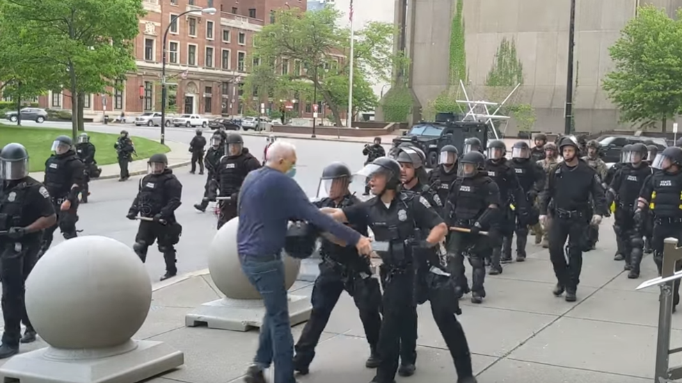 GRAPHIC VIDEO shows officers pushing protester, knocking him ...