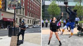 'We need something positive': Teenagers take BASKETBALL HOOP to the streets to help ease tensions in Philadelphia (VIDEO)