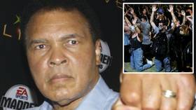 'He never threw a brick:' Muhammad Ali's widow claims boxing legend would have warned crisis-hit America 'we have run out of time'