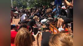 White residents wash black priests’ feet during George Floyd vigil in US