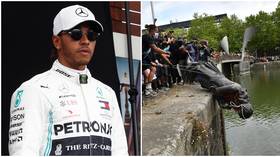'Racist symbols': F1 champion Hamilton demands removal of statues after protesters topple slave trader monument in Bristol