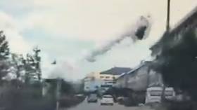 Deadly oil tanker truck explosion in China sends ruptured vehicle flying through the air (VIDEO)