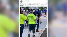 Hello, child services? Woman with baby wears ‘If they start shooting, stand behind me’ T-shirt at BLM protest, causes outrage
