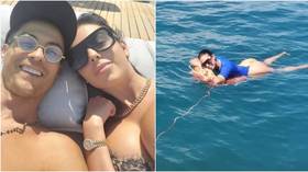 Sun-kissed: Cristiano Ronaldo and girlfriend Georgina Rodriguez soak up the rays in post-lockdown cruise (PHOTOS)