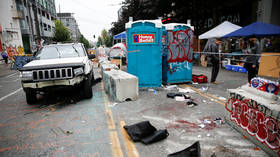 CHAZ protesters make their last stand, barricade streets with SPIKE STRIPS and port-a-potties (VIDEOS)