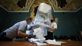 Russians vote in favor of changes to constitution potentially enabling Putin to remain as president until 2036 – exit polls