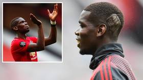 A cut above: Manchester United ace Paul Pogba shaves 'Black Lives Matter' emblem into his hair in support of anti-racism campaign